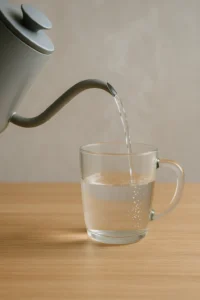 Heating water to 160°F for the drink base